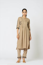 The house of khakhi: Heavy cotton front/back embroidered, pintex work kurta-pant set - Eraya