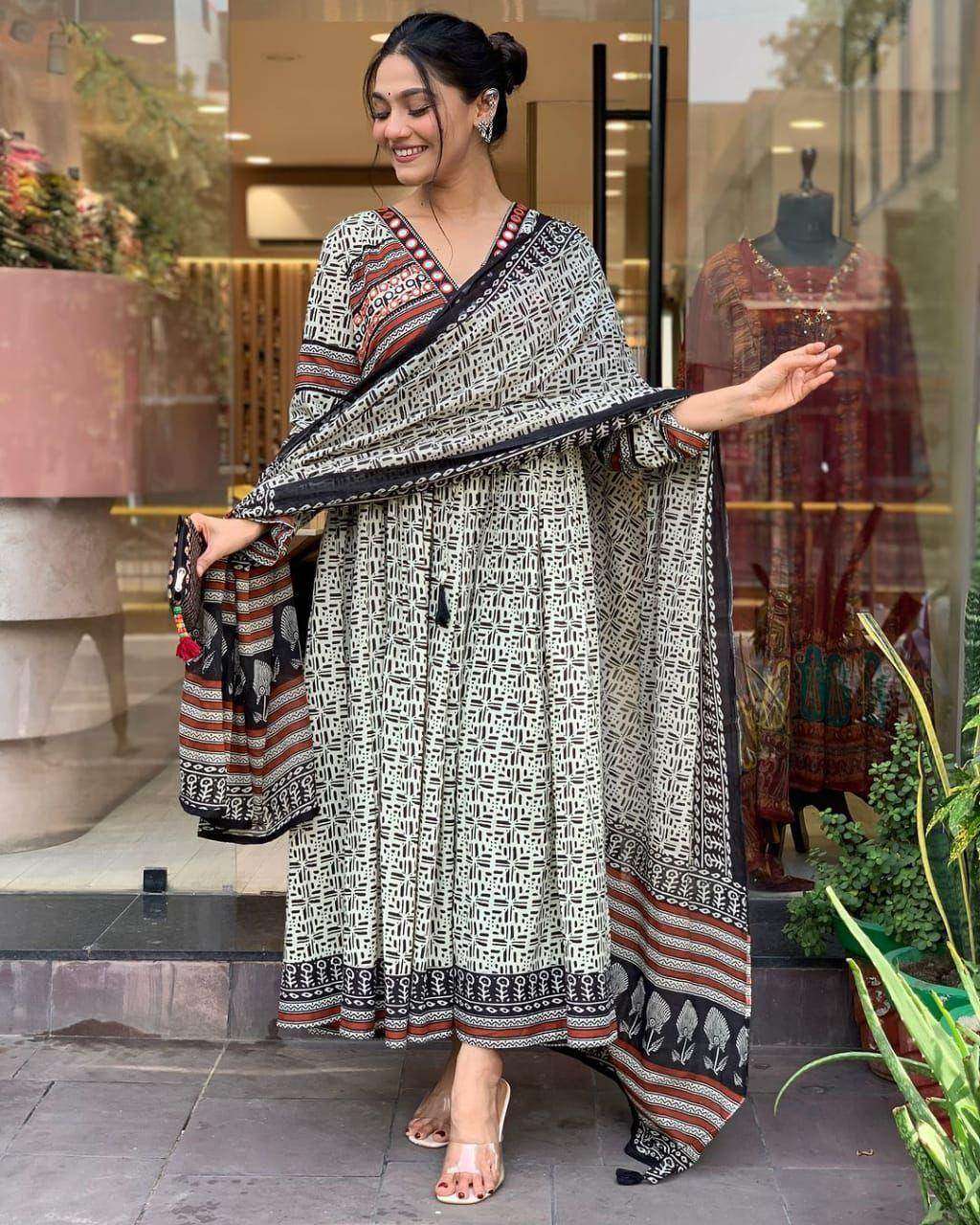 Elegant A-line block printed three piece kurti set - Eraya