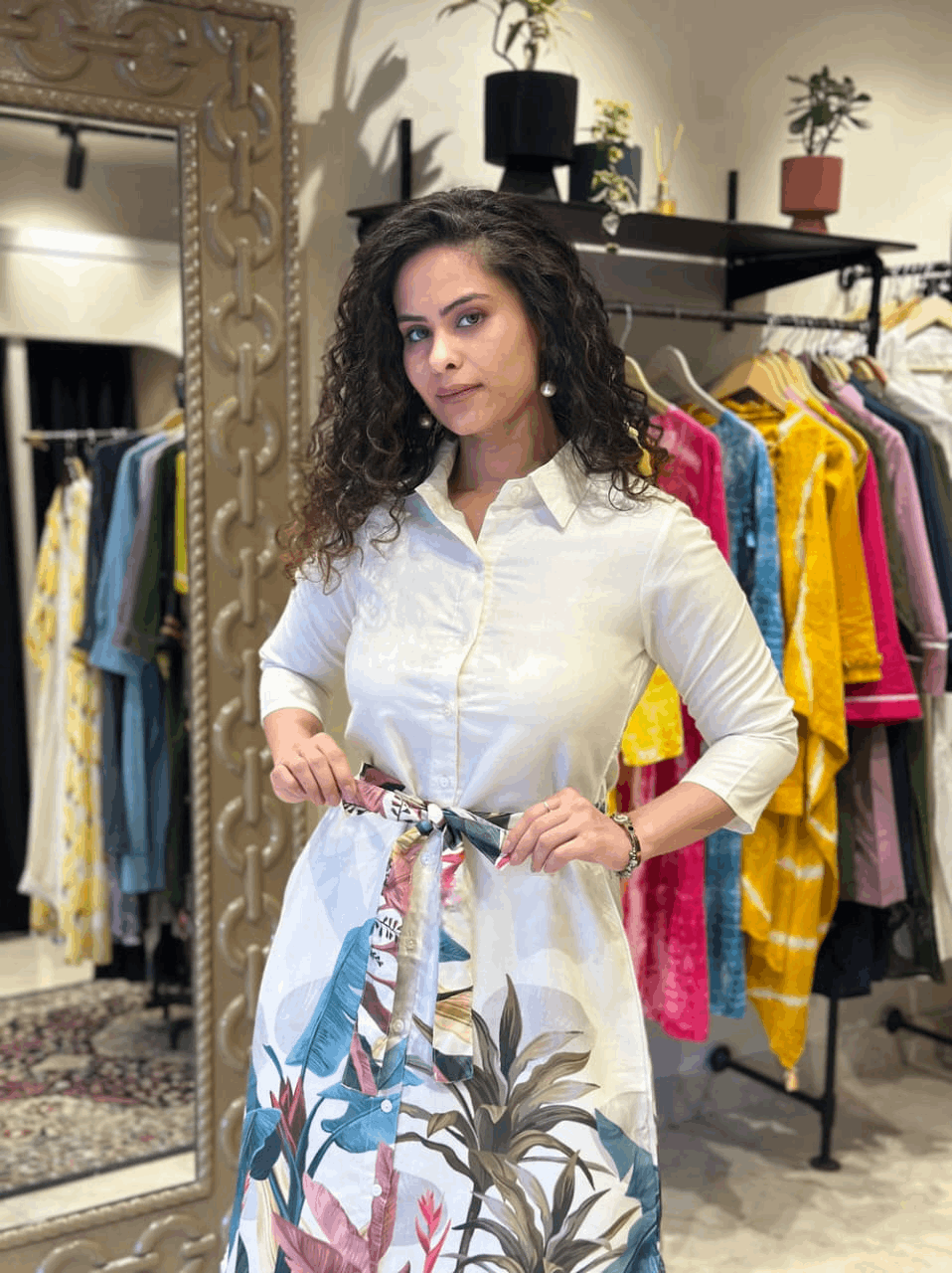 The vibrant floral white midi dress with belt