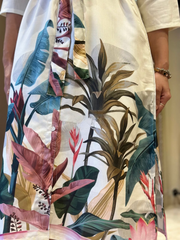 The vibrant floral white midi dress with belt