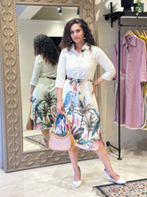 The vibrant floral white midi dress with belt