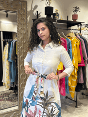 The vibrant floral white midi dress with belt